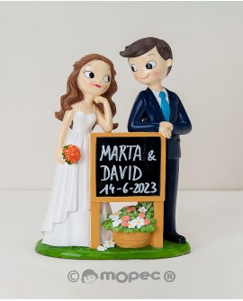 Figura par tarta de novios con pizarra. con referencia MOP-Y62 y un precio de 34,52 € de la sección figura de tarta de boda