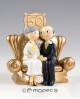 Figura para tarta de Bodas de Oro en sillón._MOP-Y500_20,50 €